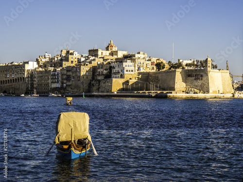 Skyline of Valletta Malta view from the harbour during sunset hour