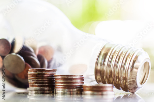 Stack of coins and light bu...