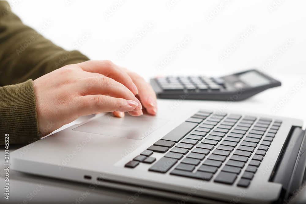 Laptop with woman hand isolated Laptop with woman hand isolated