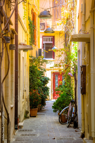 Fototapeta Naklejka Na Ścianę i Meble -  Narrow street in the old town of Chania, Crete, Greece 