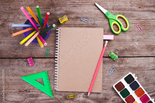 School, stationery on a wooden background. Top view. School concept. Copy space. Back to school