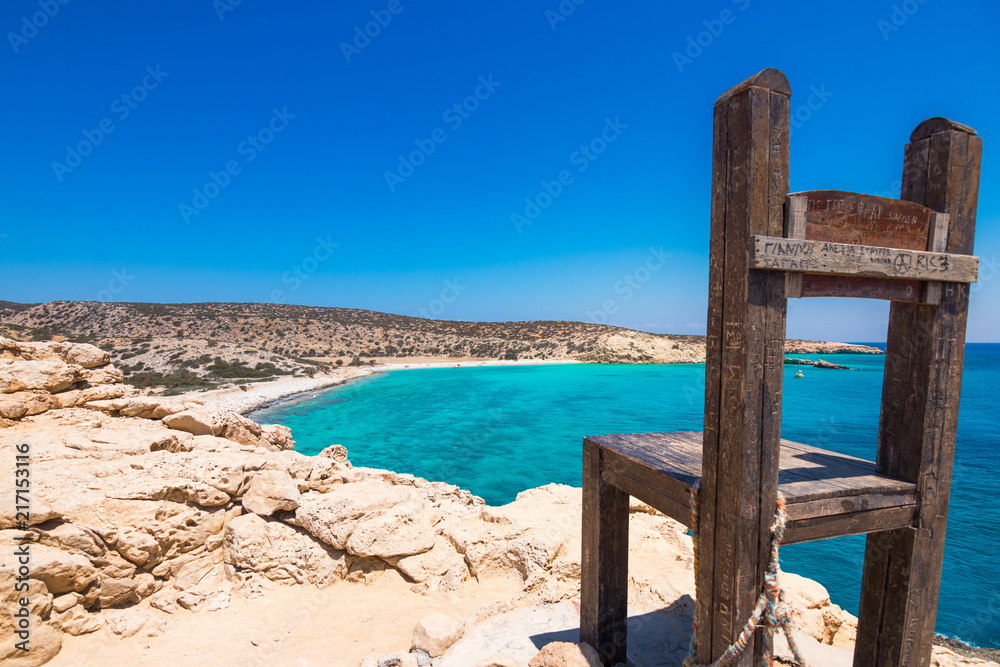 The tropical beach of Tripiti at the southern point of Gavdos island and Europe too, with the famous giant wooden chair, Greece.