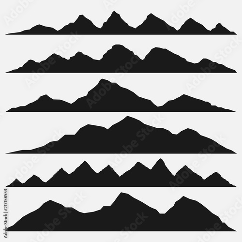 Silhouette mountain peaks.