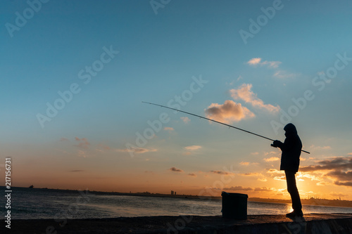 Fisherman and beautiful sunset