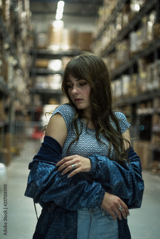 Fototapeta premium Dramatic portrait of a girl theme at the dark