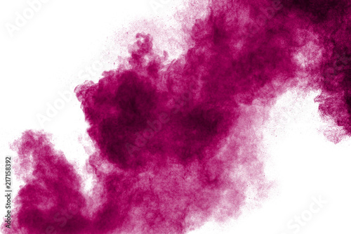Pink powder explosion isolated on white background. © Pattadis