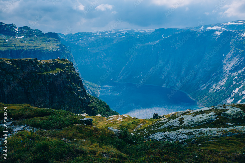 Unreal Norway landscape. Trolltunga hiking route. Nobody. Dramatic view before rain. Summer