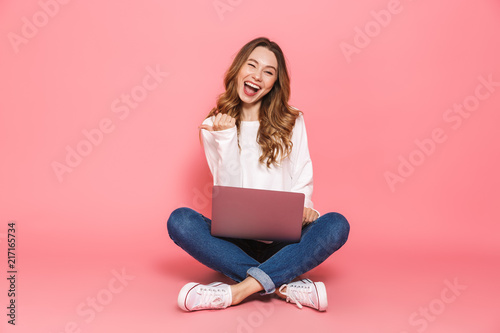 Portrait of an excited young woman