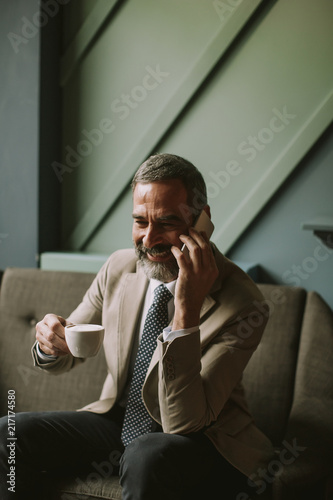 Handsome senior businessman...
