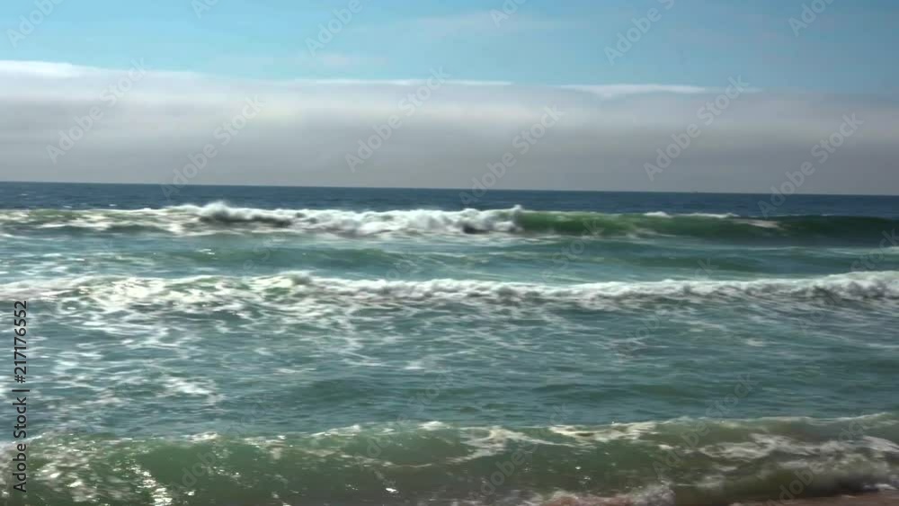 Emerald waves flowing in to shore at McClure Beach in Point Reyes, California Emerald waves flowing in to shore at McClure Beach in Point Reyes, California