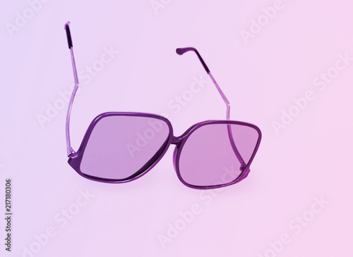 Retro sunglasses on minimal bright background.