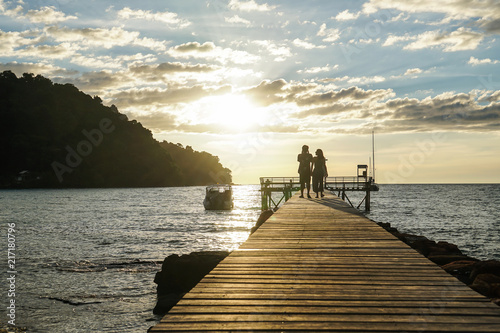 island beach sunset pier thailand people couple silhouette