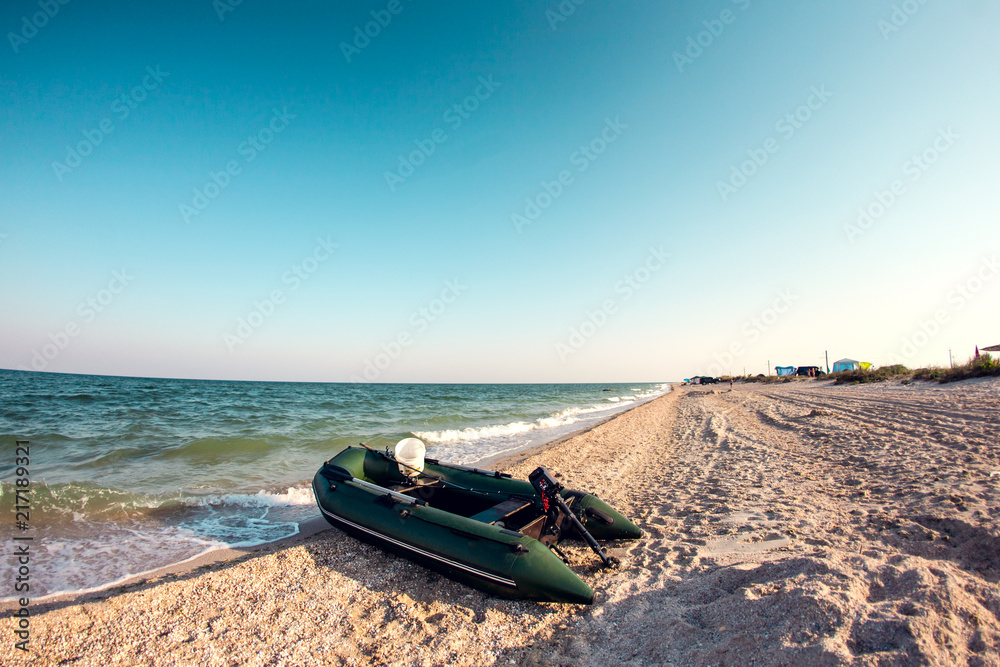 Inflatable boat on the beach. Inflatable boat on the beach.