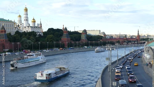 Moscow Kremlin in summer river and ships photo