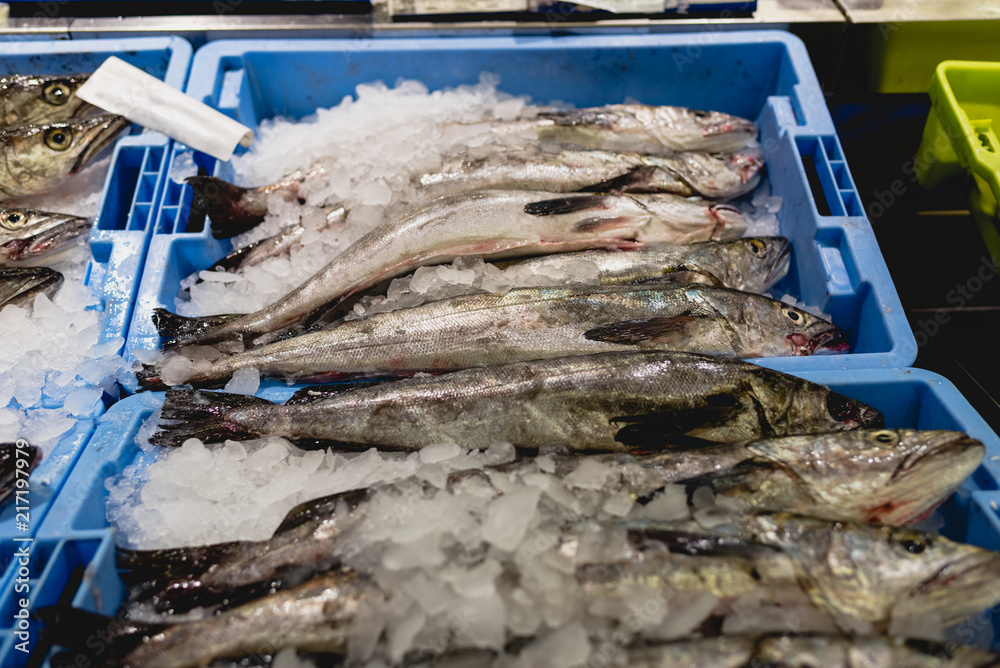 Obraz premium Hake fish in a box with ice in a fishmonger.