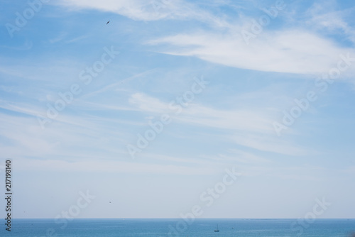 View of sky and sea with the horizon a summer day.