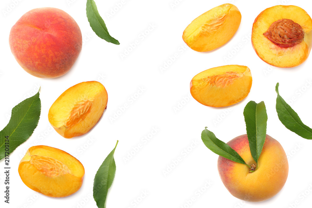 peach fruit with green leaf and slices isolated on white background. top view peach fruit with green leaf and slices isolated on white background. top view