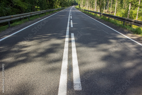 Wallpaper Mural empty car concrete road with marking in country side environment and empty space for copy or text Torontodigital.ca