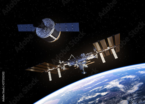 Fototapeta Naklejka Na Ścianę i Meble -  Cargo Spaceship Is Preparing To Dock With Space Station