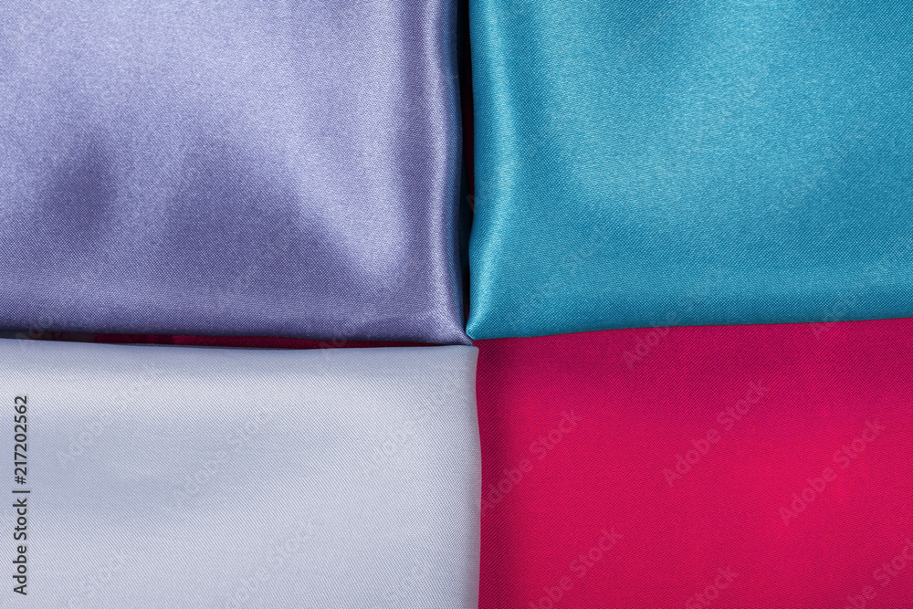Background of colorful fabrics red green pearl and purple. Background of colorful fabrics red green pearl and purple.