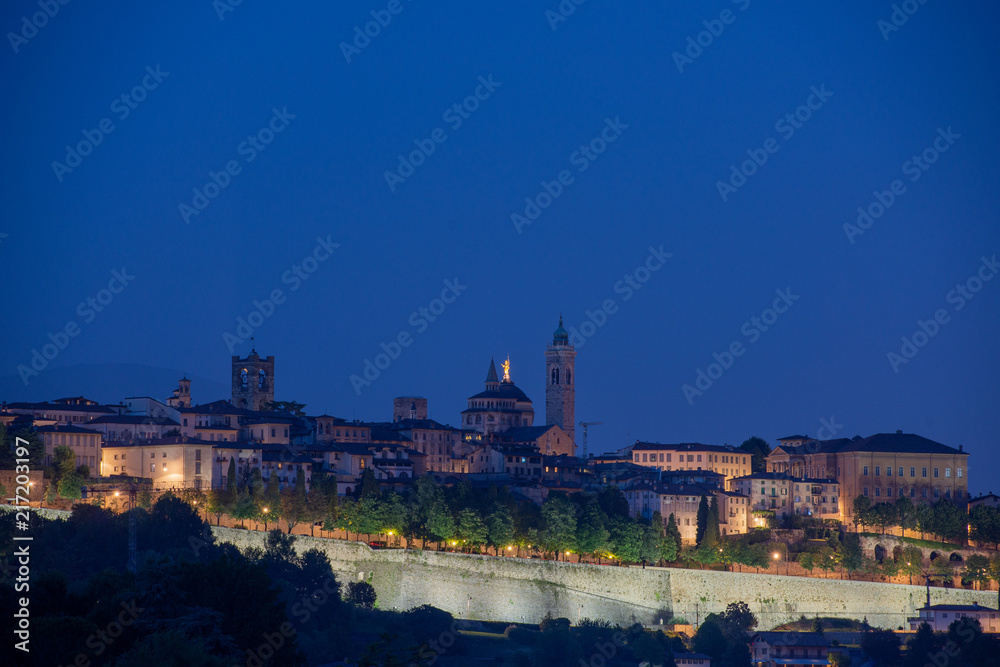 view of the ancient city of Bergamo at sunset