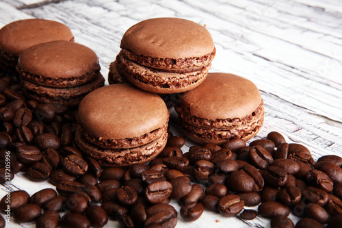 Sweet and colourful french macaroons or macaron with coffee