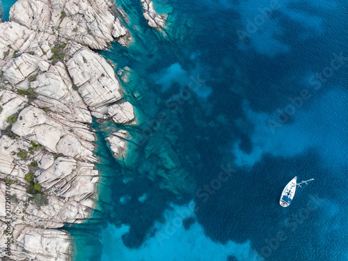 Aerial shot of a yacht near the coast