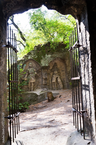 Man made cave Klacelka with sandstone sculptures created by Vaclav Levy in 1840s	between Libechov and Zelizy, Czech Republic photo