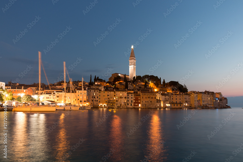 Evening in the town of Rovinj, Croatian fishing port on the west coast of the Istrian peninsula. Colourful Adriatic sea landscape in the evening. Travel concept.