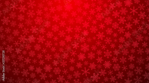 Christmas illustration with various small snowflakes on gradient background in red colors