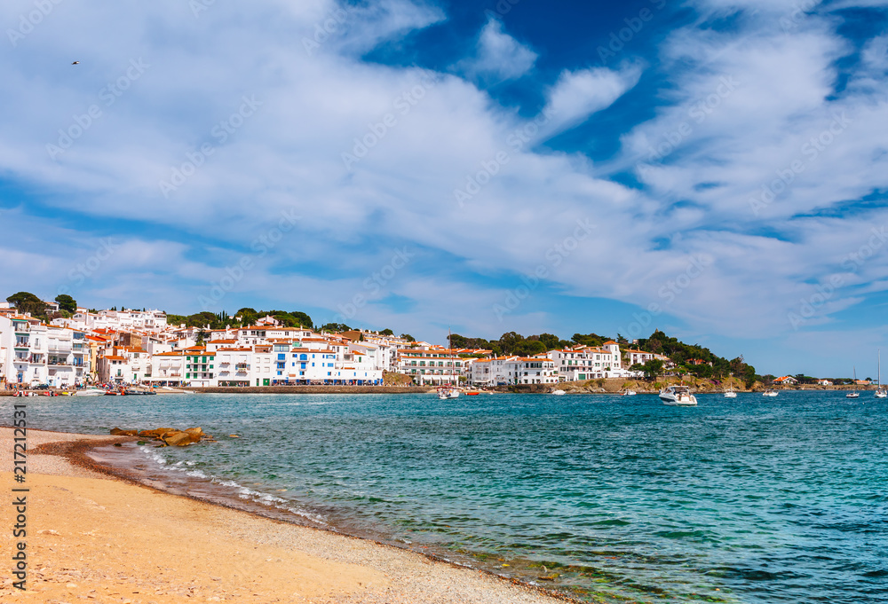 Sea landscape with Cadaques, Catalonia, Spain near of Barcelona. Scenic old town with nice beach and clear blue water in bay. Famous tourist destination in Costa Brava with Salvador Dali landmark