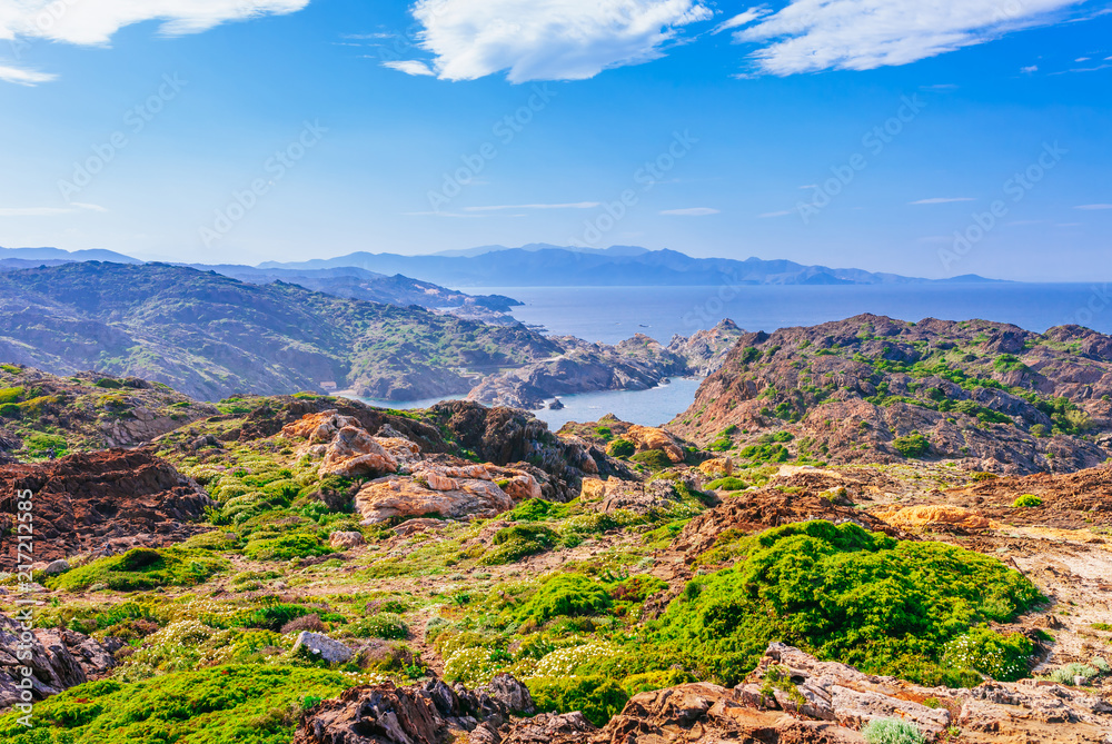 Sea landscape with Cap de Creus, natural park. Eastern point of Spain, Girona province, Catalonia. Famous tourist destination in Costa Brava. Sunny summer day with blue sky and clouds