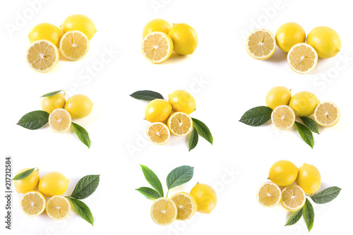 Lemons with leaves on a white background. Fresh lemons on a white background.