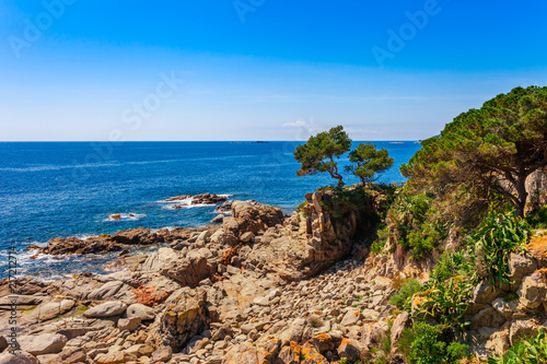 Sea landscape near Calella de Palafrugell, Catalonia, Spain near Barcelona. Scenic village with nice sand beach and clear blue water in nice bay. Famous tourist destination in Costa Brava