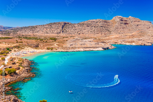 Sea skyview landscape photo of Agia Agathi beach near Feraklos castle on Rhodes island, Dodecanese, Greece. Panorama with sand beach and clear blue water. Famous tourist destination in South Europe