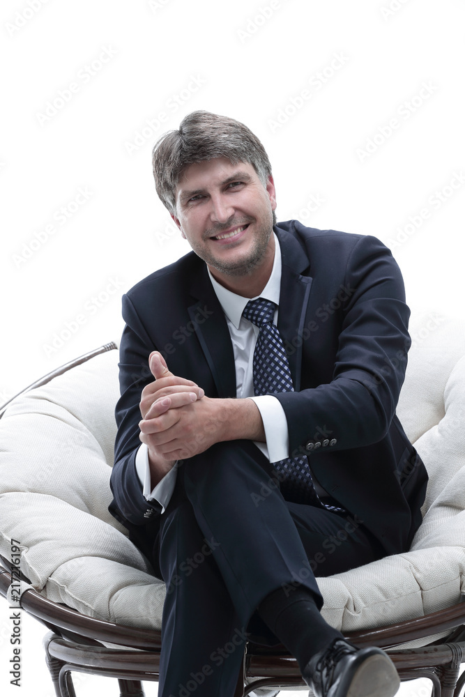 Tired businessman is resting, sitting in a soft chair. Tired businessman is resting, sitting in a soft chair.