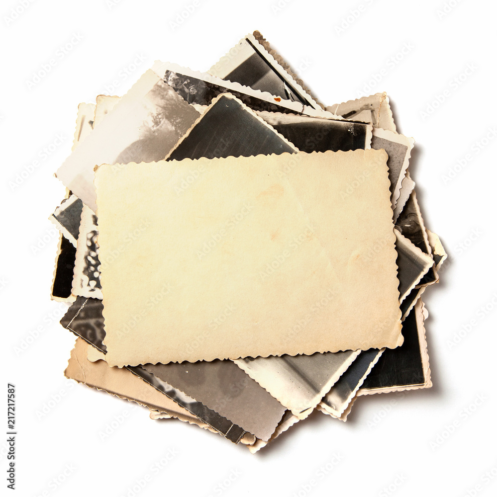 Stack old photos isolated on white background. Mock-up blank paper ...