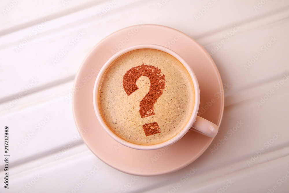 Cup of coffee with question mark on foam. I like coffee break Stock