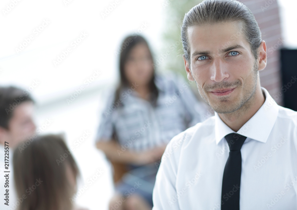 successful young business men on blurred background