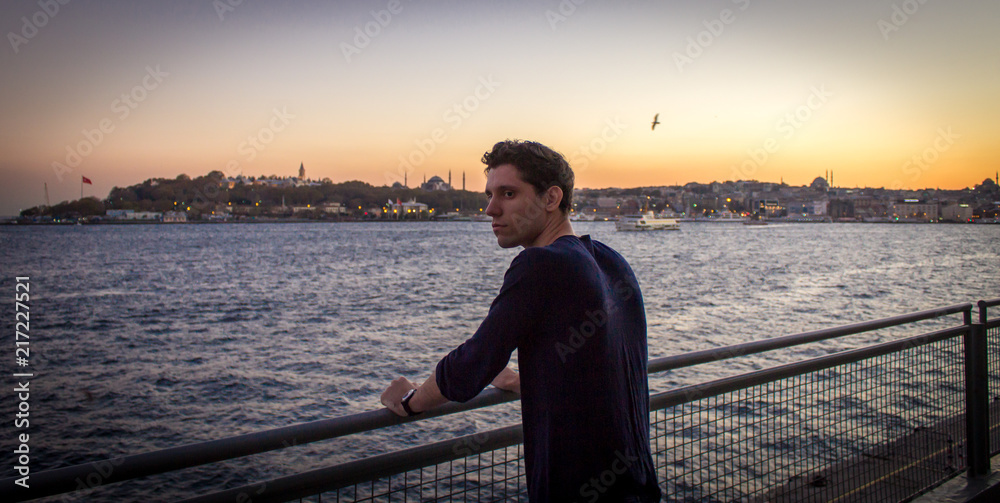 Man looking at the Bosphorus Man looking at the Bosphorus
