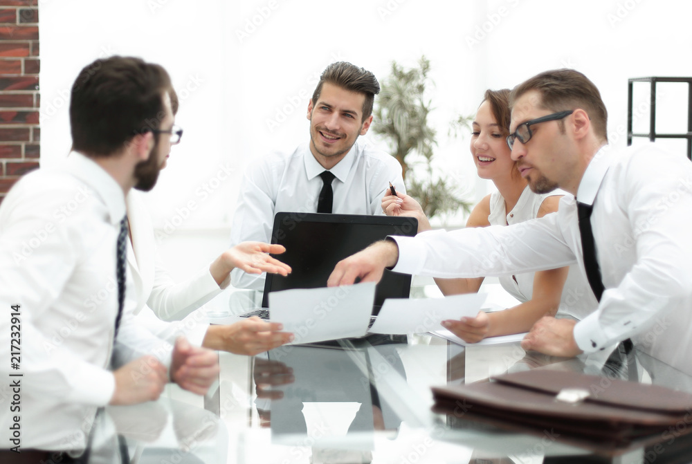 business team discussing financial documents. business team discussing financial documents.