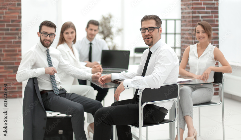 boss and business team sitting at their Desk boss and business team sitting at their Desk