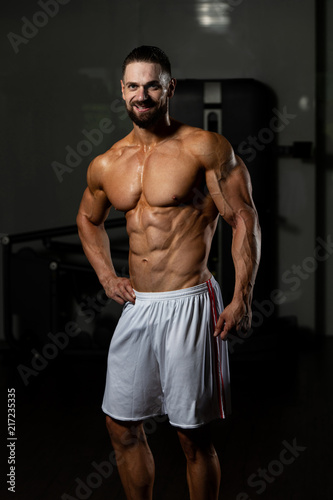 Ripped Mature Man In Modern Fitness Center