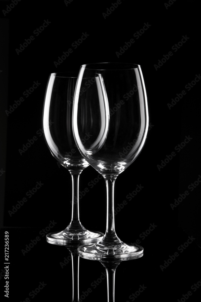 transparent wine glass on the black transparent wine glass on the black