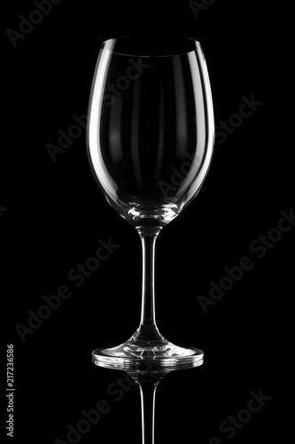 transparent wine glass on the black