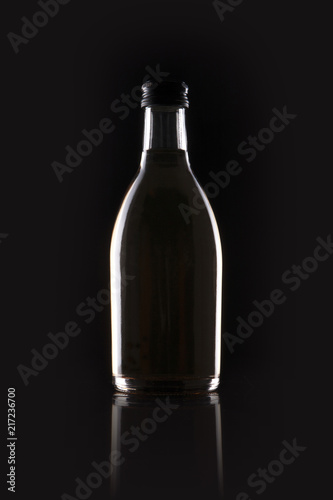 glass container silhouette on the black