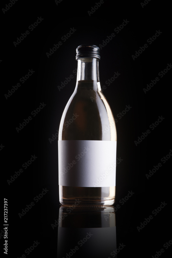 empty bottle isolated black.