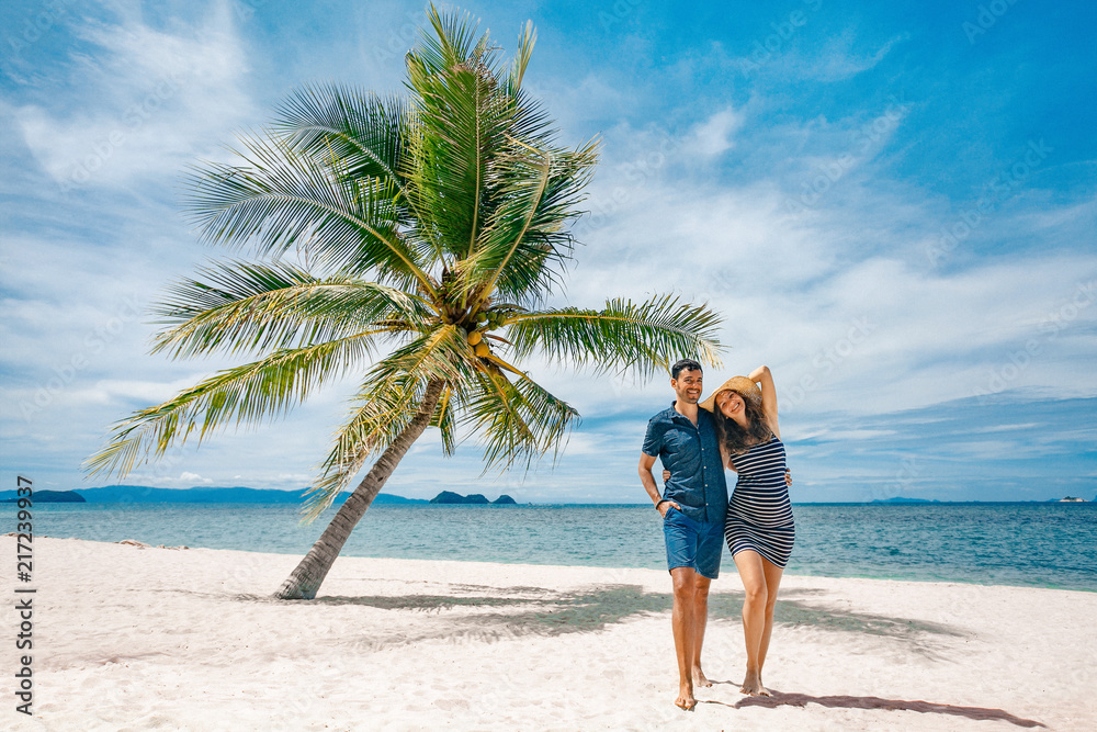 cheerful happy pregnant woman and husband having fun on the beach cheerful happy pregnant woman and husband having fun on the beach