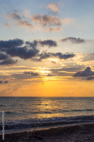 Amazing sea sunset  the sun  waves  clouds