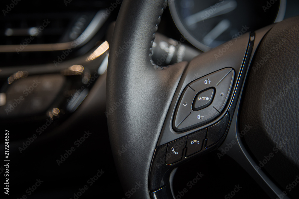 Modern car illuminated dashboard and Electric power Steering wheel